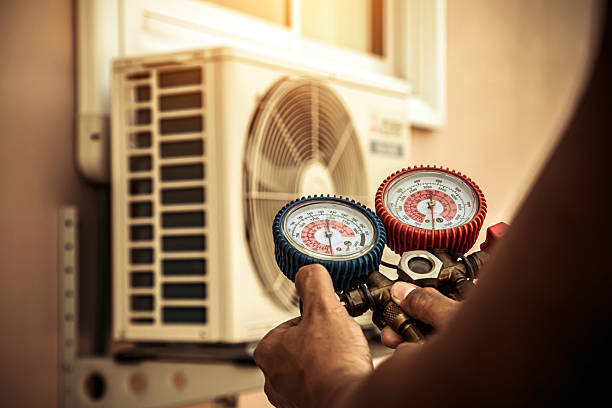 Professional Air Conditioning Service technician working in Mason, TX
